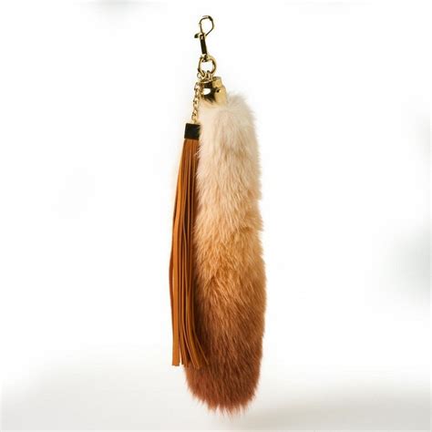 fox tail keychain louis vuitton|louis vuitton luggage charms.